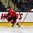 GRAND FORKS, NORTH DAKOTA - APRIL 16: Switzerland's Philipp Kurashev #23 skates with the puck while Russia's Mark Rubinchik #6 chases him down during preliminary round action at the 2016 IIHF Ice Hockey U18 World Championship. (Photo by Matt Zambonin/HHOF-IIHF Images)

